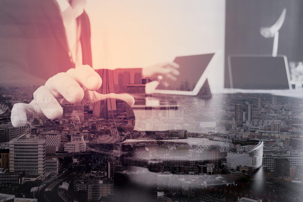 man-using-voip-headset-with-digital-tablet-and-laptop-computer-a
