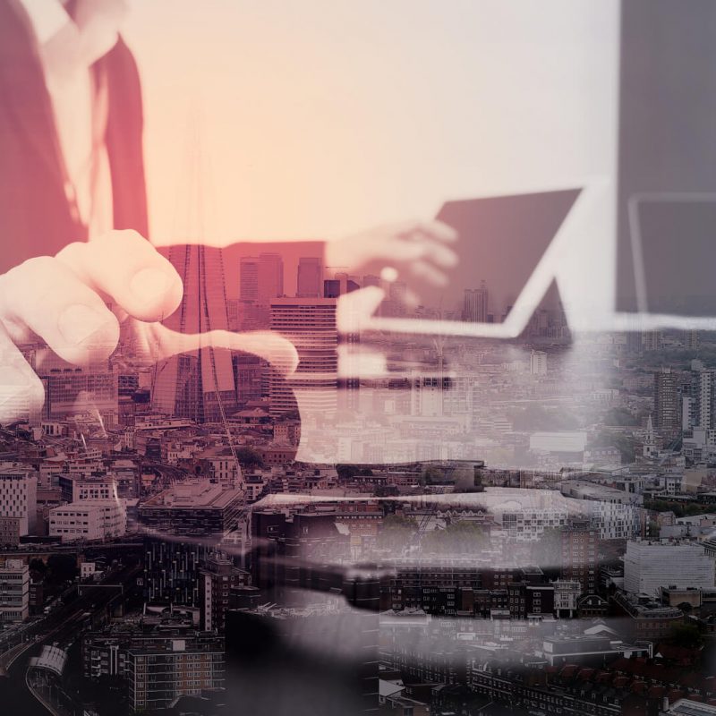 man-using-voip-headset-with-digital-tablet-and-laptop-computer-a